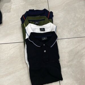 Four Paul smith xs polo shirts.